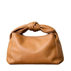 สินค้านี้ดูเหมือนจะเป็นกระเป๋าหนังอิตาลีแบบผูกเชือกมีสไตล์คล้ายกับสินค้าที่นำเสนอโดยนักออกแบบเช่นกระเป๋าสำนักงาน - Product Image 1