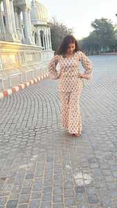 Elegant Women <b>Peach</b> Printed Co Ord Set Casual Wear Full Sleeve <b>Top</b> With Matching Palazzo Pants - Product Image 1