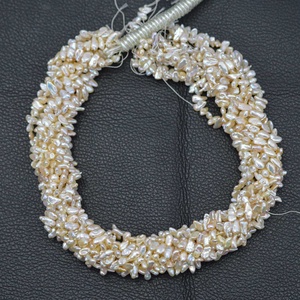 ไข่มุกน้ำจืดสีครีมธรรมชาติขนาด 5 มม. 6 มม. 7 มม. แบบไม่เจียระไน เม็ดพลอยหลวมสำหรับทำเครื่องประดับตามสั่ง จากผู้ผลิตและผู้จัดจำหน่าย - Product Image 2