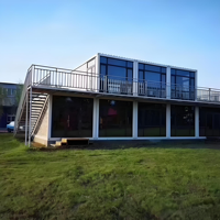 Maison conteneur préfabriquée de 20 pieds avec toit en pente, mur-rideau en verre, conteneur démontable en kit pour habitation, boutique ou bureau