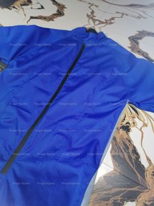 Mono azul de cuerpo entero con bolsillos, transpirable, de spandex y poliéster, unisex, para adultos, con cremallera, estilo sencillo. - Product Image 3