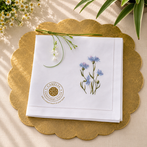 Fresh spring blooms embroidered on <b>linen</b> create a welcoming atmosphere for everyday meals. - Product Image 1
