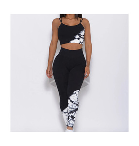 ชุดโยคะผู้หญิงดีไซน์สวย โลโก้ด้านหน้าสั่งทำได้ คุณภาพสูง ผ้าสแปนเด็กซ์/โพลีเอสเตอร์ ระบายอากาศได้ดี น้ำหนักเบา ไร้ตะเข็บ ชุด 2 ชิ้น ราคาประหยัด - Product Image 1