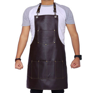 Delantal de Barbero Personalizado, Uniforme Unisex para Hombres y Mujeres, Producto de Alta Calidad Hecho con Tela Vaquera, Tirantes Cruzados en la Espalda, Venta al Por Mayor - Product Image 1