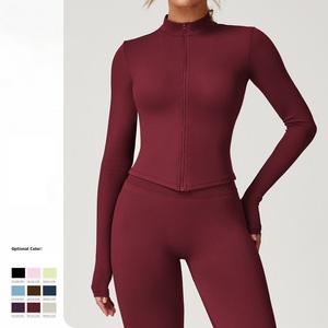 ชุดออกกำลังกายผู้หญิง เสื้อโยคะสีพื้นไร้ตะเข็บ แขนยาว เสื้อครอปออกกำลังกาย แห้งเร็ว ระบายอากาศ ชุดโยคะ - Product Image 1