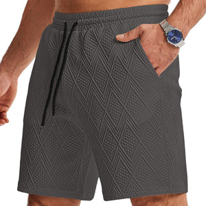 Shorts de jogging décontractés pour hommes, couleurs unies, taille élastique, séchage rapide, pour entraînement, gym et sport, avec poches arrière. - Product Image 1