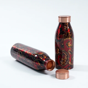 Botella de agua de cobre puro personalizada, producto exclusivo con diseño de flores impresas en esmalte. - Product Image 1