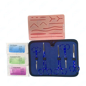 Kit complet de pratique de suture chirurgicale de qualité supérieure avec source d'alimentation manuelle et coussin de suture incurvé - Product Image 1