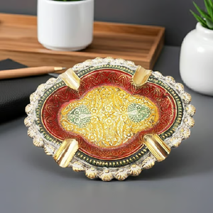 Oval <b>vintage</b> brass <b>ashtray</b> decorated with vibrant hand-painted patterns, available at wholesale prices. - Product Image 1