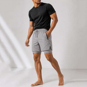 Shorts de sport pour hommes gris uni à séchage rapide avec cordon de serrage à la taille, mi-longs, en polyester tissé, avec fermetures éclair, style sportif - Product Image 2