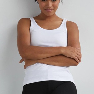 Camiseta sin mangas de algodón blanca para mujer, cuello redondo, sin mangas, informal, transpirable, de punto, color liso, longitud regular - Product Image 1