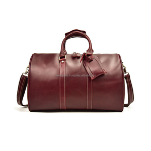 Bolsa de Viaje de Cuero Genuino para Hombre, Forma Ovalada, Asa Superior, Cierre de Hebilla, Capacidad de 20-36L, Diseño Duradero - Product Image 1