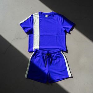 Conjunto Deportivo Unisex Azul y Blanco con Bloques de Color, Camiseta de Manga Corta y Pantalones Cortos con Cordón, Transpirable, Estilo Deportivo de Verano para Adultos - Product Image 1