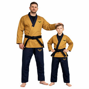 Ensemble d'uniformes d'arts martiaux personnalisés en or et bleu marine pour hommes et garçons, combinaison d'entraînement en coton de qualité supérieure pour le karaté et le BJJ, vente en gros - Product Image 1