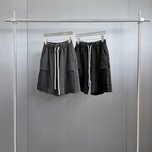Shorts pour hommes en tissu tricoté respirant, couleur unie, avec cordon de serrage et poches, taille mi-haute, style décontracté - Product Image 3