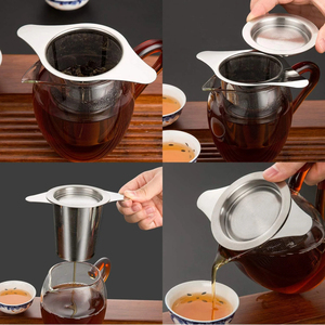 Infuseur à thé élégant en acier inoxydable portable, filtre à thé réutilisable en forme de boule avec longue poignée, couleur argent - Product Image 3