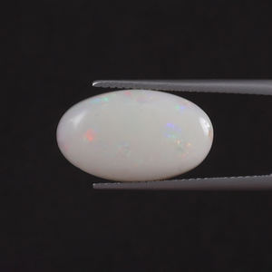 โอปอลธรรมชาติสีขาวรับรองโดย IGI น้ำหนัก 5.19 กะรัต รูปทรงวงรี ขนาด 18x11 มม. ตัดด้วยมือ ขัดเงา ผ่านการเคลือบแว็กซ์/น้ำมัน สภาพดี - Product Image 1