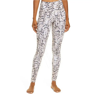 Leggings de yoga taille haute sans couture pour femme, couleur unie, en polyester/nylon, avec taille élastique et tissu extensible réfléchissant - Product Image 1