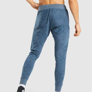 กางเกงวิ่งออกกำลังกายผู้ชาย ทรงปกติ น้ำหนักเบา คุณภาพสูง ผลิตจากผ้าโพลีเอสเตอร์/คอตตอนผสม แห้งเร็ว มีกระเป๋าข้าง - Product Image 2