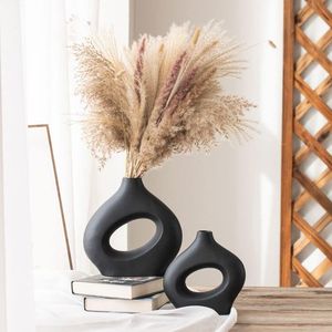 Vase floral en métal design, élégant centre de table pour salon, décoration élégante pour la maison, matériau durable, finition premium, accent décoratif - Product Image 1