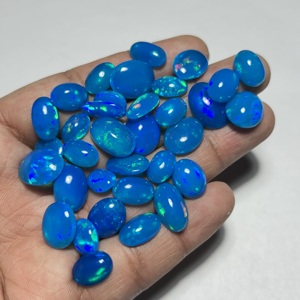 โอปอลเวโลแท้ทรงรีแบบคาโบชอง คุณภาพเยี่ยม หลายสี โอปอลไพรบา โอปอลไฟสีน้ำเงิน หินประจำเดือนตุลาคม - Product Image 2