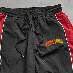 Pantalones de chándal de nailon con botones personalizados estilo urbano para hombre, venta al por mayor directa de fábrica, de pierna ancha acampanada, cortavientos - Product Image 6