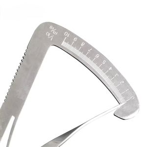 Cet outil, un calibre de couronne dentaire Iwanson, est utilisé pour des mesures précises en dentisterie et en laboratoire. - Product Image 1