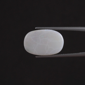 โอปอลสีขาวธรรมชาติคุณภาพดี รับรองโดย IGI พลอยเม็ดเดี่ยว 4.67 กะรัต รูปไข่ 18.5x12 มม. ตัดด้วยมือ ขัดเงา ผ่านการเคลือบด้วยแว็กซ์/น้ำมัน - Product Image 1