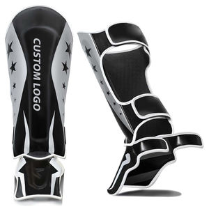 Nouvel Arrivage Protège-tibias en Cuir Blanc et Noir pour MMA, Kickboxing, Muay Thai, Arts Martiaux, avec Fermeture Auto-agrippante – Équipement de Boxe Protecteur - Product Image 1