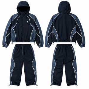 Conjunto Deportivo Reflectante de Dos Piezas con Diseño Colorblock Inspirado en las Carreras, Chaqueta con Capucha y Pantalones Holgados, Ropa Urbana Personalizada de Fabricante - Product Image 1