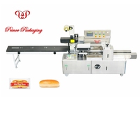 Machine d'emballage automatique horizontale pour pains à hot-dogs et croissants