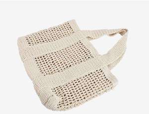 Transformez instantanément votre look avec ce sac élégant en tissu naturel, doté d'une forme structurée, idéal pour les activités quotidiennes. - Product Image 2
