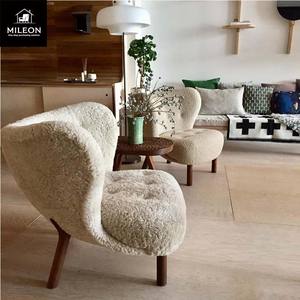 أريكة مفردة على الطراز الاسكندنافي كرسي بذراعين لطراز الفندق كرسي أريكة بسيط على شكل خاص مصمم فردي مريح مخصص من القماش - Product Image 4