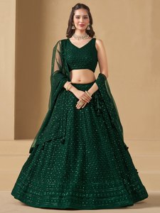 Lehenga Choli vert brodé en satin à motif floral avec pompons, robe longue traditionnelle deux pièces à taille empire pour femme, idéale pour les mariages et les fêtes - Product Image 1