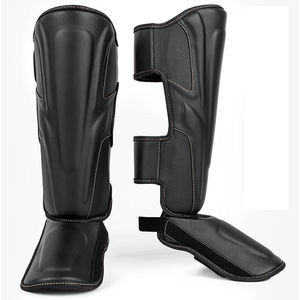 Protections de tibia pour MMA adultes |   Protections de jambes pour l'entraînement au Muay Thai |   Cuir PU durable |   Fournisseur en gros OEM ODM - Product Image 1