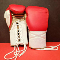 Gants de boxe à lacets de qualité compétition pour hommes et femmes, gants professionnels pour combattants avec coutures renforcées et fermeture de pouce.