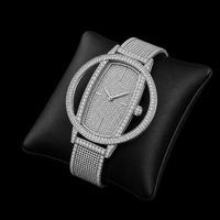 Montre de luxe à diamants glacés, boîtier ovale en acier inoxydable argenté, bracelet maille milanaise, mouvement quartz ETA, montre-bracelet habillée pour hommes et femmes