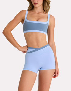 Conjuntos Deportivos de Dos Piezas para Mujer, Ropa de Gimnasio y Yoga, Top Deportivo Sin Costuras con Espalda Cruzada y Pantalones Cortos Tipo Ciclista, Personalización OEM - Product Image 1
