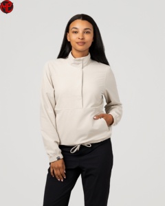 Blouson coupe-vent beige pour femme à col montant, minimaliste, avec taille ajustable et boutons recouverts, idéal pour l'entraînement - Product Image 1