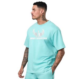 Camiseta gráfica lavada de color verde menta para hombre, camiseta informal de algodón con cuello redondo y manga corta, ropa de calle, suave y transpirable - Product Image 1