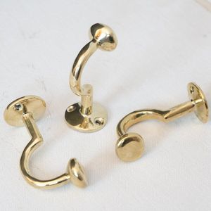 Crochets muraux en laiton distinctifs, à la fois fonctionnels et décoratifs, pour des aménagements de maison ou d'espace de travail soignés. - Product Image 5