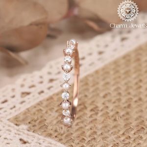 แหวนผู้หญิงชุบทองคำสีกุหลาบประดับเพชรโมอิสซาไนต์ทรงคลาสสิกจาก Charm_Jewells รับรองโดย IGI น้ำหนัก 3 กรัม - Product Image 6