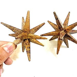 Venta al por Mayor de Piedras de Caligrafía con Forma de Estrella Merkaba de 12 Puntas Hechas a Mano, con Estilo Feng Shui, Piedra Metafísica para Terapia - Product Image 1