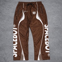 Nouvel ensemble de survêtement coupe-vent avec patch brodé, veste à capuche zippée imprimée et pantalon de survêtement à empiècements contrastants