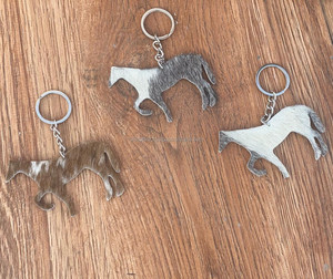 Nouveau Western élégant vente chaude cheveux sur cuir de vachette porte-clés en cuir véritable porte-clés forme Unique porte-clés de luxe en cuir - Product Image 4