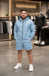 ชุดเซ็ตเสื้อผ้ากีฬา REXFIT SPORTS ผ้าไนลอนสีฟ้าอ่อนสำหรับผู้ชาย เสื้อแจ็คเก็ตกันลมน้ำหนักเบา กางเกงขาสั้น ชุดกีฬาแนวสตรีทแวร์ - Product Image 3