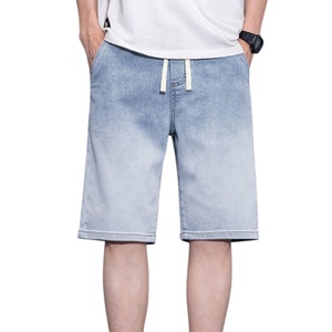 กางเกงยีนส์ขาสั้นผู้ชายทรงหลวมสำหรับฤดูร้อน ผ้าฝ้าย 100% สีน้ำเงิน ยางยืด ทรงตรง สวมใส่สบาย แฟชั่นอเนกประสงค์ แห้งเร็ว ระบายอากาศได้ดี - Product Image 1