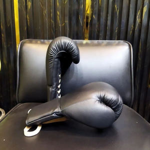 ถุงมือชกมวยหนัง PU ลาเท็กซ์คุณภาพสูง 12 ออนซ์ สำหรับผู้ชายและผู้หญิง ใช้สำหรับฝึกซ้อม ระบายอากาศได้ดีและซับเหงื่อ - Product Image 5