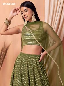 Proveedor de conjuntos de lehenga verde oliva semicosturados con corte en A, de georgette de alta calidad con hilo Zari y múltiples lentejuelas, de Surat. - Product Image 6