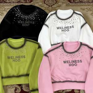 Conjunto de Moda Urbana Casual Unisex: Sudadera Blanca Bordada con Pedrería y Pantalones Anchos Negros - Product Image 1